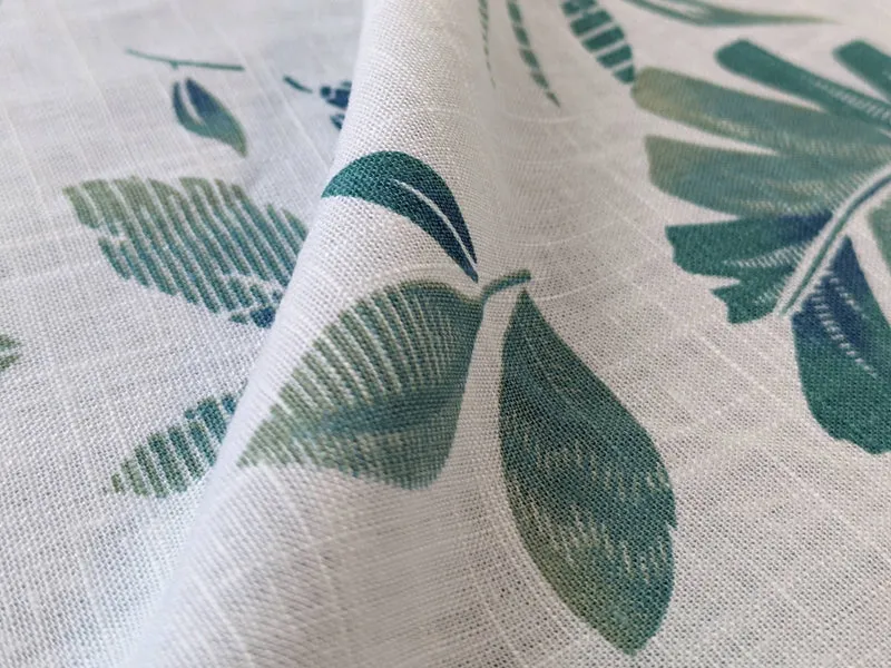 Leinentischdecke, Tischdecke mit grünen Blättern aus Leinenstoff