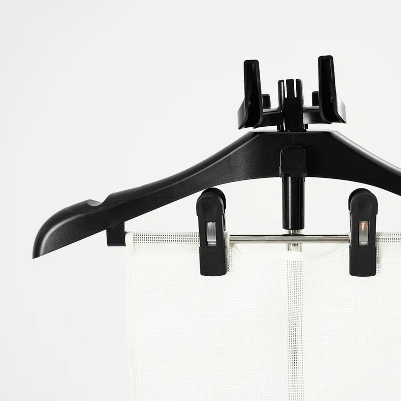 Flexible Ironing Board with Clothes Hanger and Pegs